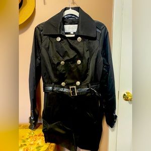 Black rain jacket with snake skin accents